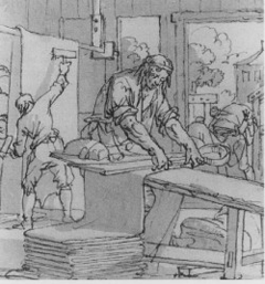 Een droogscheerder aan het werk in zijn werkplaats. Een droogscheerder aan het werk in zijn werkplaats.